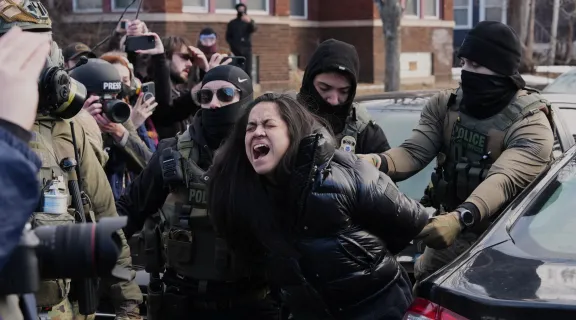 Federal immigration agents filmed dragging a woman from her car in Minneapolis